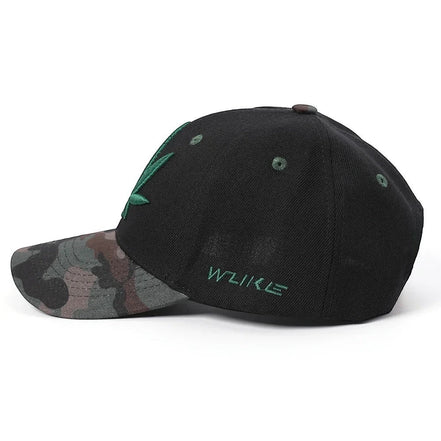AKJ Fashion black baseball cap with green leaf embroidery and camouflage brim, adjustable strap, unisex design.