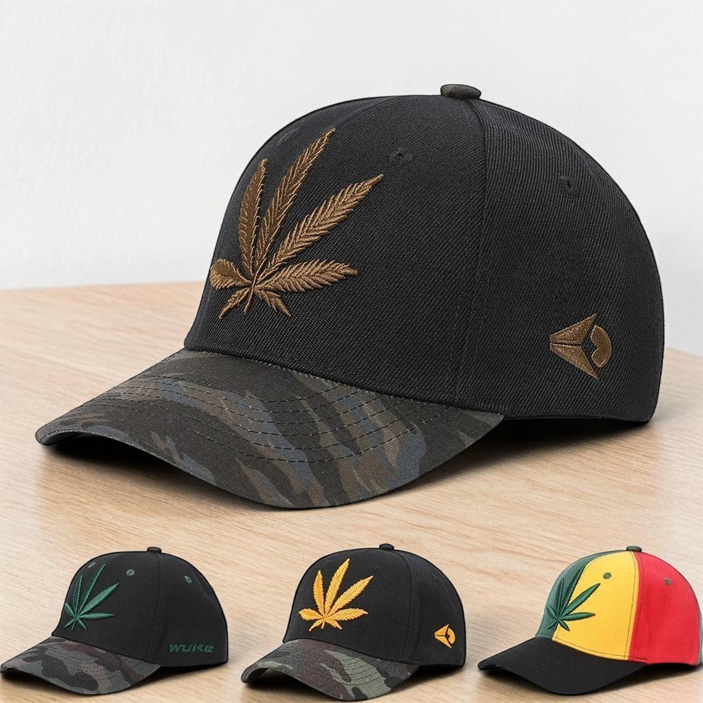 AKJ Fashion black polyester baseball cap with embroidered gold cannabis leaf and camouflage brim. Adjustable strap for outdoor use.