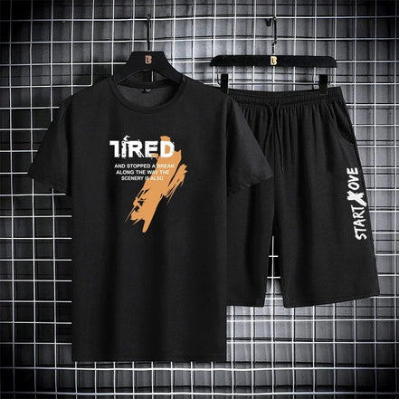 AKJ Fashion black two-piece men's quick-dry sport set with graphic print t-shirt and drawstring shorts.