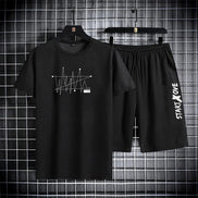 AKJ Fashion black 2-piece men's quick-dry sport set with graphic print t-shirt and shorts.