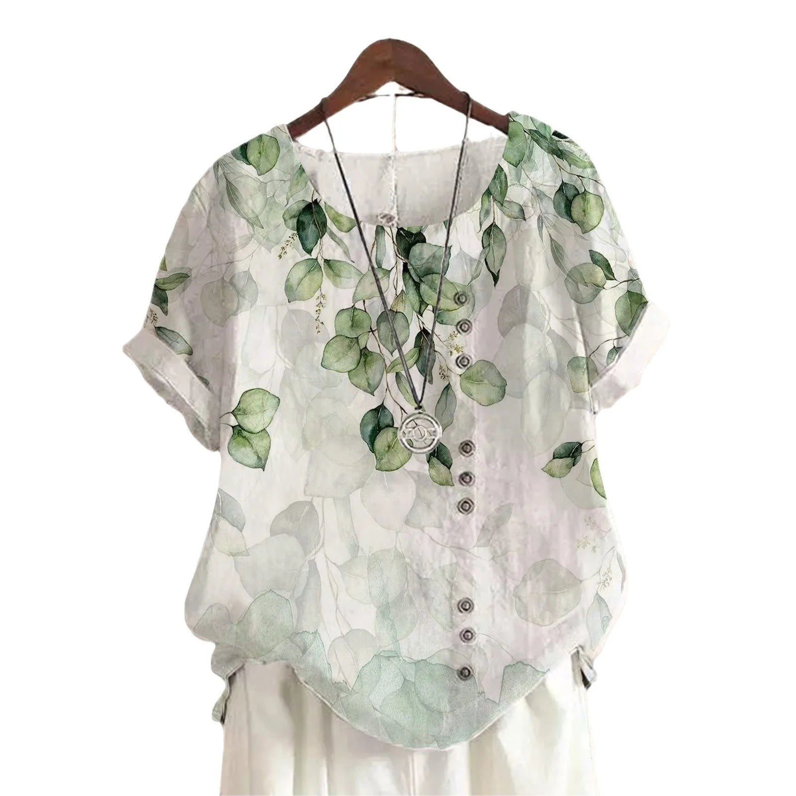 AKJ Fashion blouse verte à imprimé feuilles d'eucalyptus, col rond, manches courtes retroussées, boutonnage décalé.