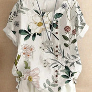AKJ Fashion blouse blanche à imprimé floral violet et vert, effet lin, boutonnage décalé, manches courtes