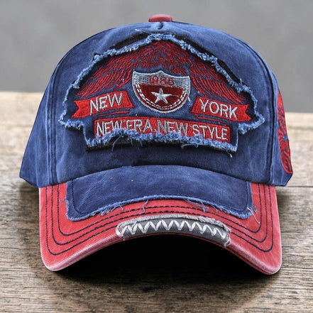 AKJ Fashion blue and red distressed cotton denim baseball cap with New York embroidery and adjustable strap.