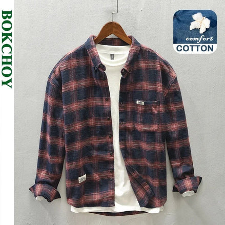 AKJ Fashion Chemise à carreaux bleu marine et écru en coton brossé, coupe décontractée, col classique, poche poitrine.