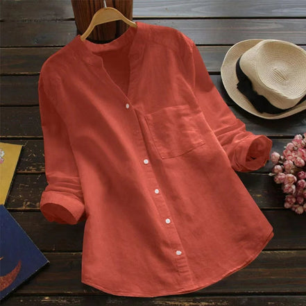 Chemise AKJ Fashion orange corail à col mao, manches longues retroussables, effet lin, avec poche poitrine.
