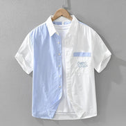 Chemise AKJ Fashion homme manches courtes color-block bleu ciel et blanc, poche poitrine brodée.