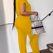AKJ Fashion ensemble jaune safran 2 pièces, top zip manches papillon et pantalon large taille haute fluide.