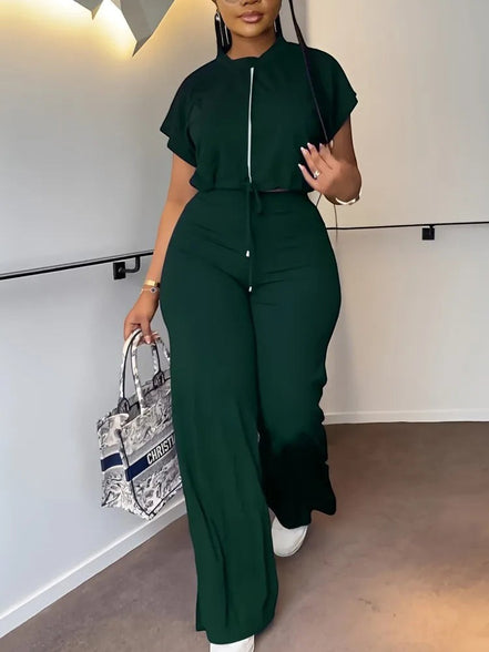 AKJ Fashion ensemble deux pièces vert émeraude, top zippé et pantalon large taille haute fluide.
