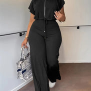 AKJ Fashion ensemble 2 pièces noir, top zip manches papillon et pantalon large taille haute fluide.