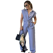 AKJ Fashion ensemble bleu grisé 2 pièces: chemise sans manches nouée et pantalon large fluide. Tissu léger.