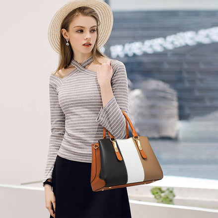 Ensemble 4 sacs à main AKJ Fashion en cuir color block doré, noir, blanc et marron, design épuré.