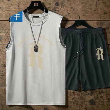 Ensemble AKJ Fashion 2 pièces pour homme : débardeur blanc et short gris foncé, coupe athlétique, idéal pour le sport.