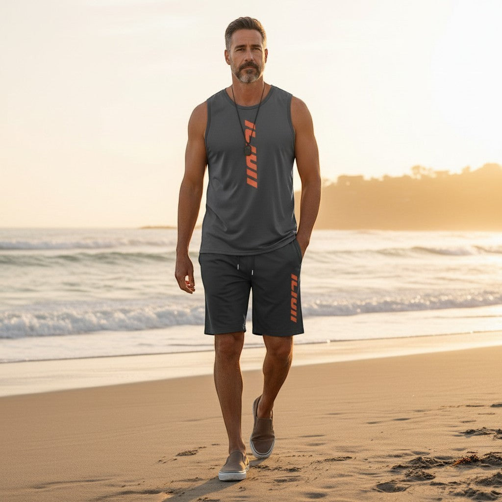 Ensemble sport AKJ Fashion homme 2 pièces gris foncé, t-shirt sans manches et short assorti avec logo orange, idéal pour l'entraînement et le quotidien.