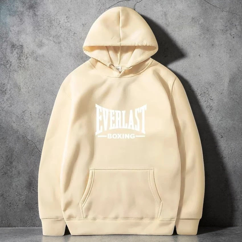 Sweat à capuche unisexe beige EVERLAST en molleton doux, avec logo blanc et poche kangourou.
