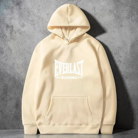 Sweat à capuche unisexe beige EVERLAST en molleton doux, avec logo blanc et poche kangourou.