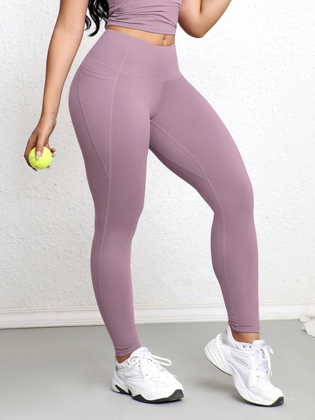 AKJ Fashion legging violet clair avec poches latérales, coupe ajustée, idéal pour le sport et le quotidien.