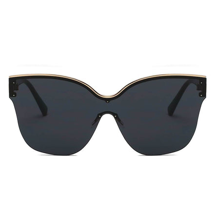 Lunettes de soleil oversize œil de chat AKJ Fashion, monture noire et dorée, verres fumés, style luxe contemporain.