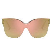 Lunettes de soleil oversize œil de chat AKJ Fashion, monture dorée semi-monture, verres roses dégradés or, protection UVA/UVB.