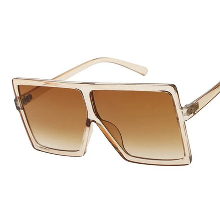 Lunettes de soleil carrées SHOPAHOLIC pour femme, monture plastique transparente, verres dégradé marron effet miroir.