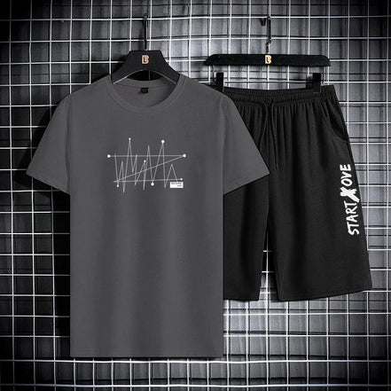 AKJ Fashion men's dark grey t-shirt and black shorts set with graphic print and text detail. Quick-dry athletic wear.