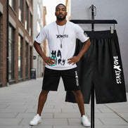 AKJ Fashion men's white graphic t-shirt and black athletic shorts set. Quick-dry, casual summer wear.