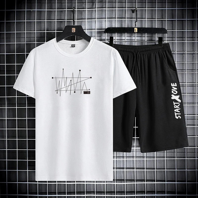 AKJ Fashion men's white t-shirt and black shorts set with graphic print and text detail. Quick-dry fabric.