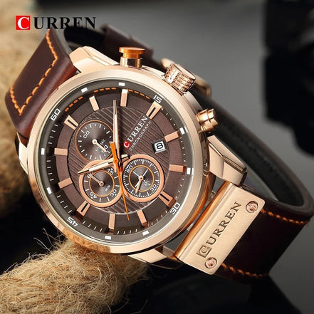 Montre chronographe CURREN homme en acier inoxydable or rose, cadran marron avec 3 sous-compteurs et bracelet en cuir marron.