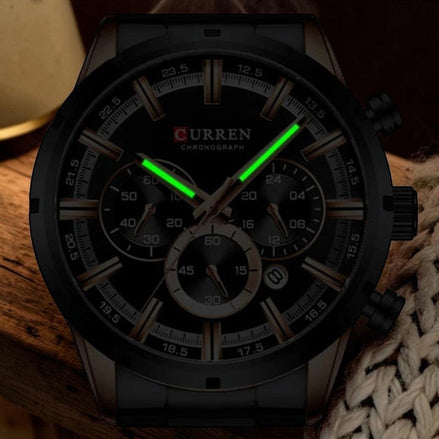 Montre AKJ Fashion CURREN argent chronographe, bracelet acier inoxydable, aiguilles lumineuses et date automatique. Style moderne.