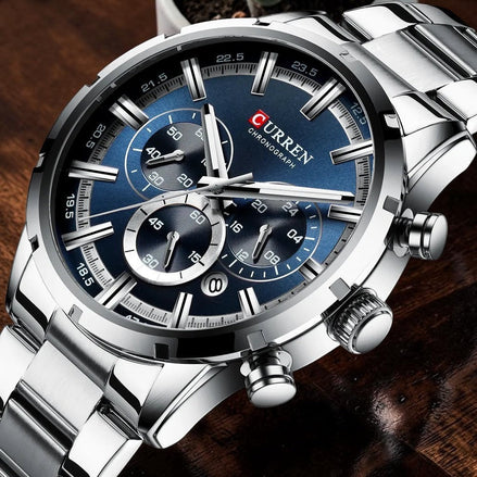 Montre AKJ Fashion CURREN argentée en acier inoxydable avec cadran bleu, chronographe et date automatique.