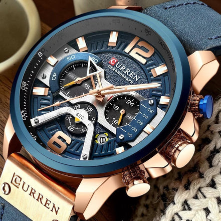 Montre CURREN homme chronographe bleu et or rose, bracelet cuir bleu, style urbain, cadran multifonctionnel.