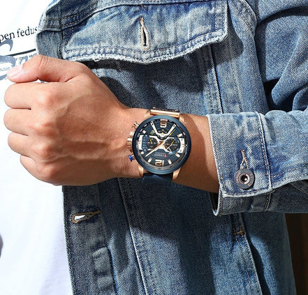Montre CURREN homme avec bracelet en cuir bleu et cadran bleu foncé, boîtier doré, style urbain décontracté.