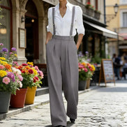 AKJ Fashion pantalon large gris taille haute fluide avec bretelles, coupe tailleur, style androgyne chic.