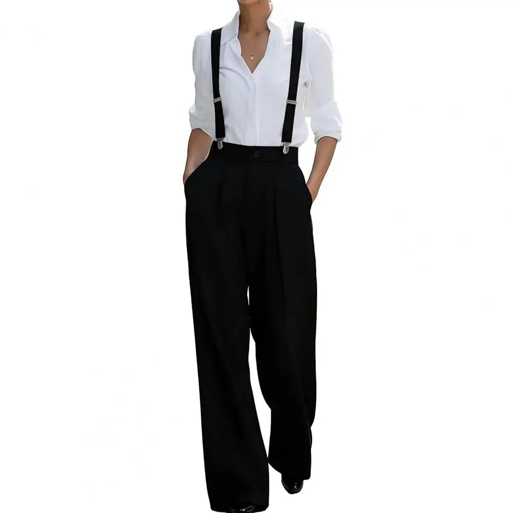 AKJ Fashion Pantalon large noir taille haute avec bretelles, coupe tailleur fluide, poches discrètes, style androgyne.