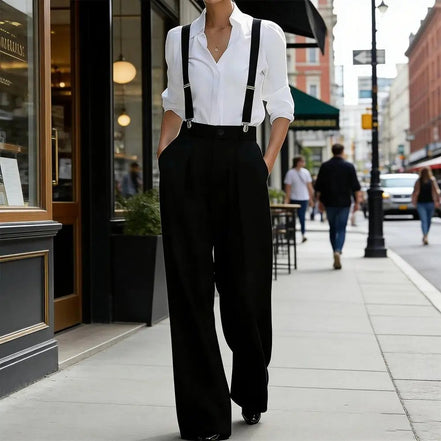 AKJ Fashion Pantalon large noir taille haute fluide avec bretelles, coupe tailleur allongeant la silhouette.