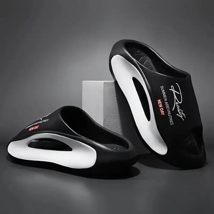 AKJ Fashion Pantoufles unisexes noires et blanches avec inscription 'Reality New Day', idéales pour l'été.