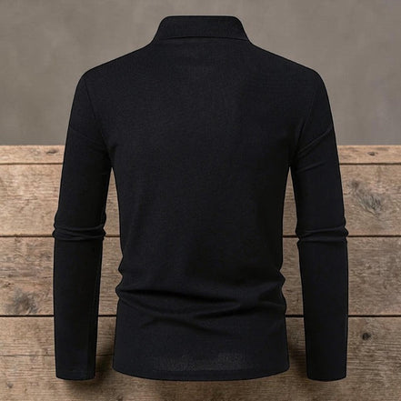AKJ Fashion polo homme manches longues noir en coton, col polo, coupe ajustée, idéal pour un look casual ou smart-casual.
