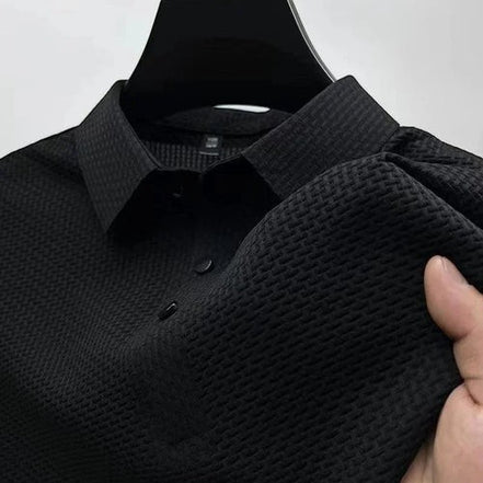 Polo noir AKJ Fashion homme manches courtes en coton léger, col classique, texture nid d'abeille, idéal pour l'été.