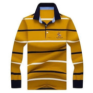 Polo AKJ Fashion à manches longues rayé jaune et bleu marine, col polo, coton léger, broderie joueur de polo sur la poitrine.