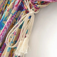 AKJ Fashion robe bohème d'été à col V, imprimé floral multicolore, avec cordons à pompons. Tissu léger et fluide.