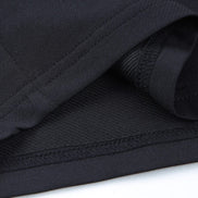 AKJ Fashion short de fitness noir en coton respirant, coupe athlétique avec cordon de serrage et poches.